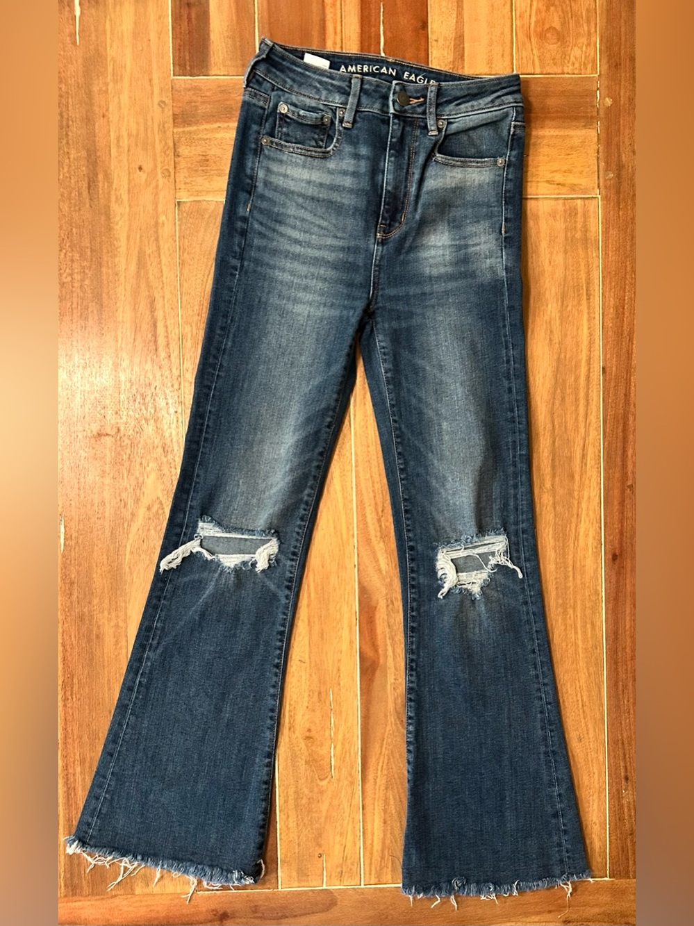 American Eagle Highest Rise Flare Jeans Blue Distressed Raw Hem Size 0 Regular
